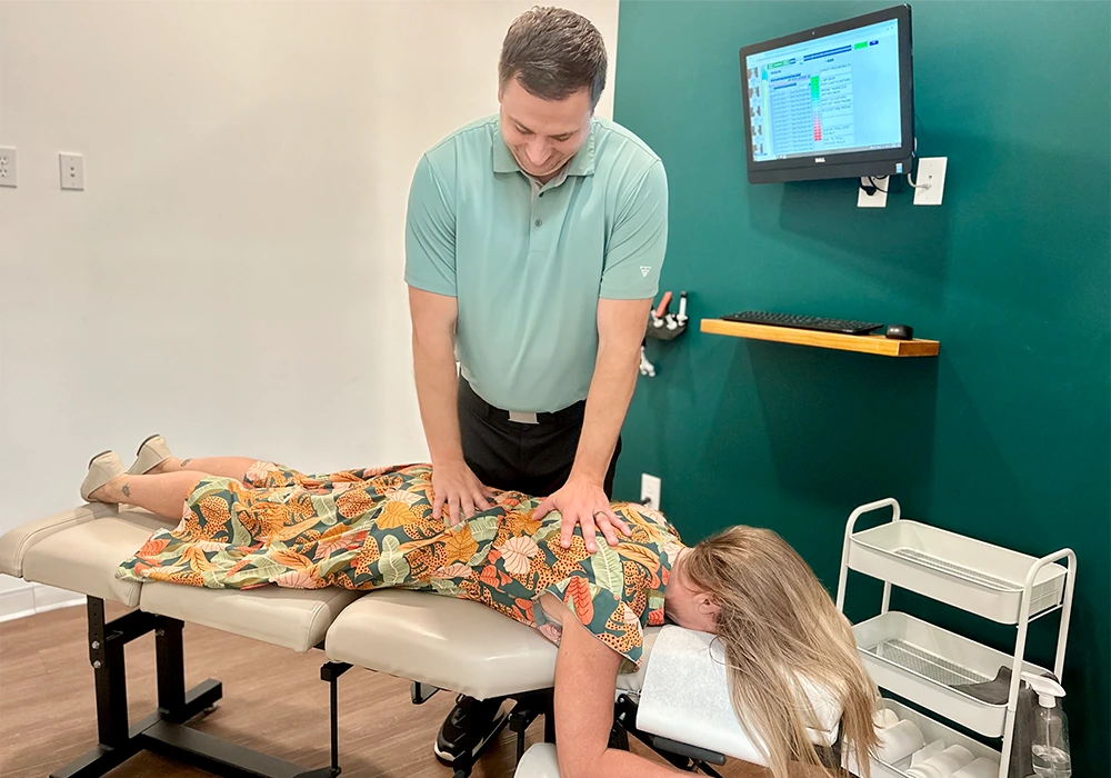 Andrew Green Adjusting A Patient HP Mobile